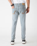 BLEACHED BLUE TAPERED FIT JEANS