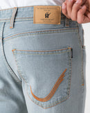 BLEACHED BLUE TAPERED FIT JEANS